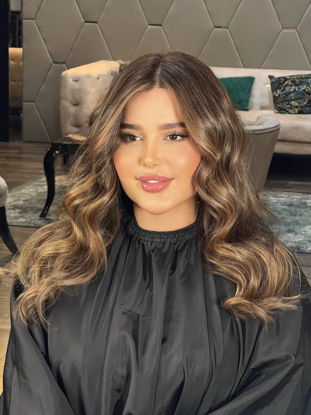 Medium brown waves with caramel face-framing highlights