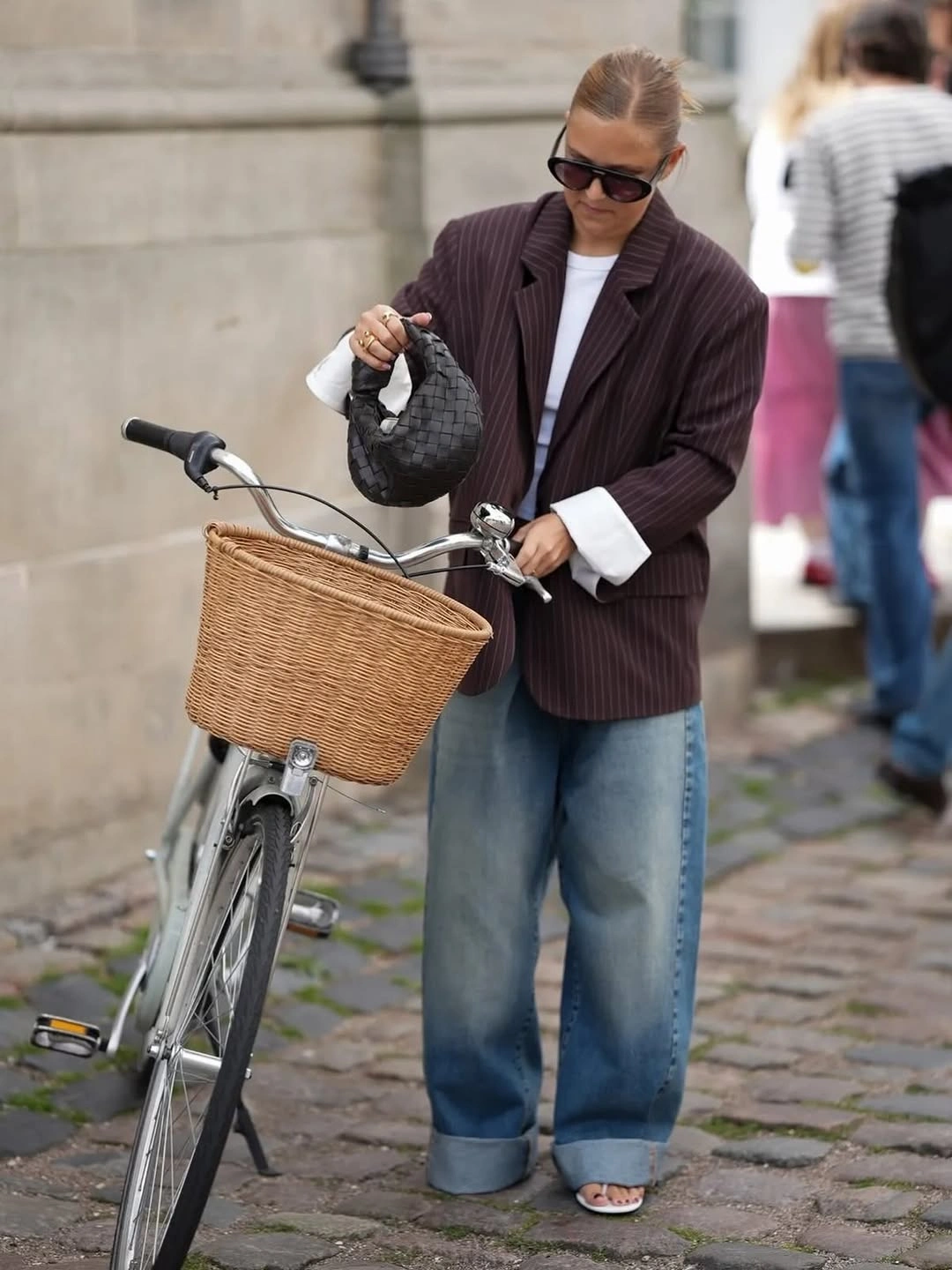 Burgundy pinstripe blazer with white shirt and cuffed jeans