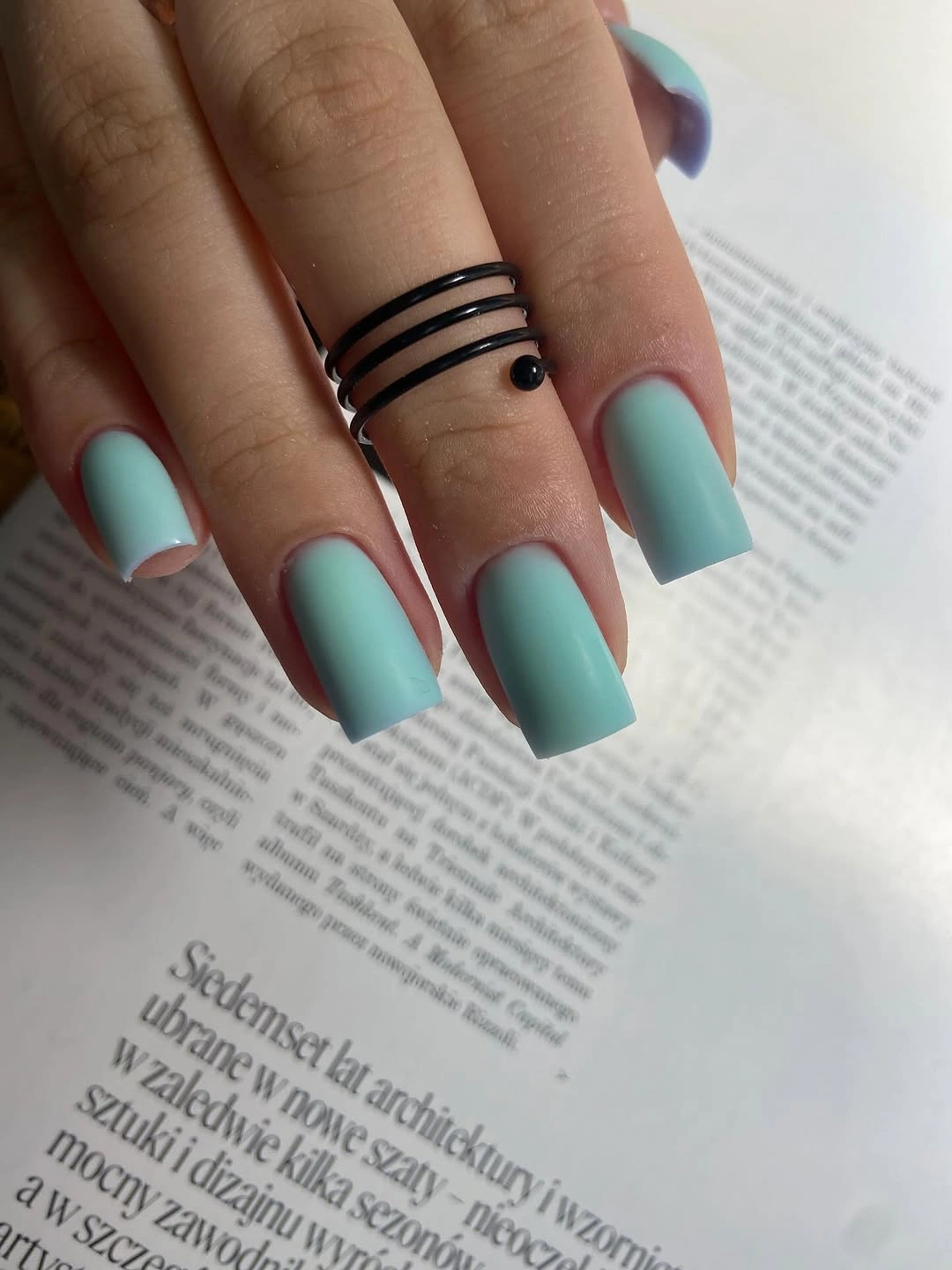 Short muted teal square nails with a clean glossy finish
