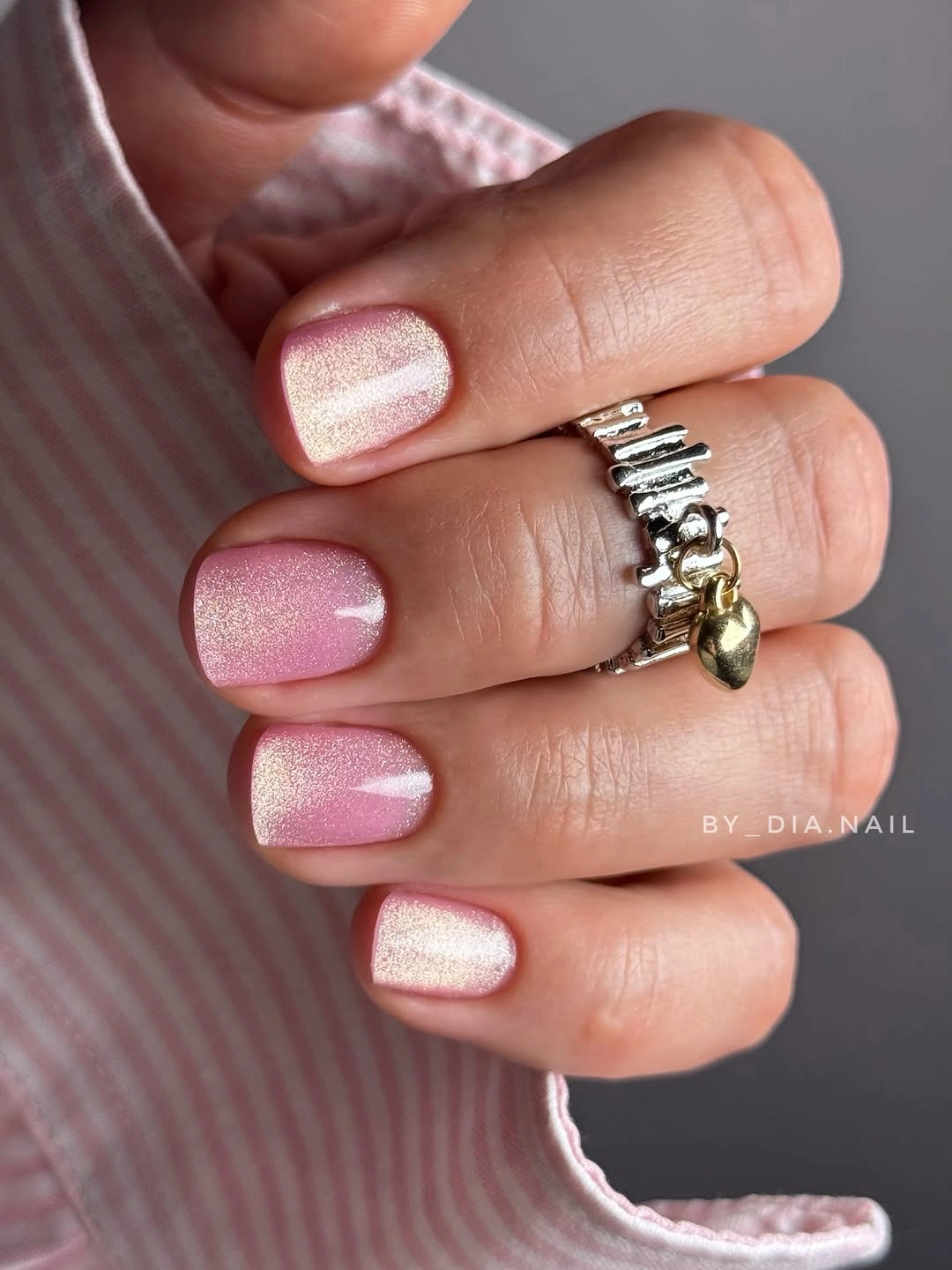 Short soft pink square nails with fine even shimmer