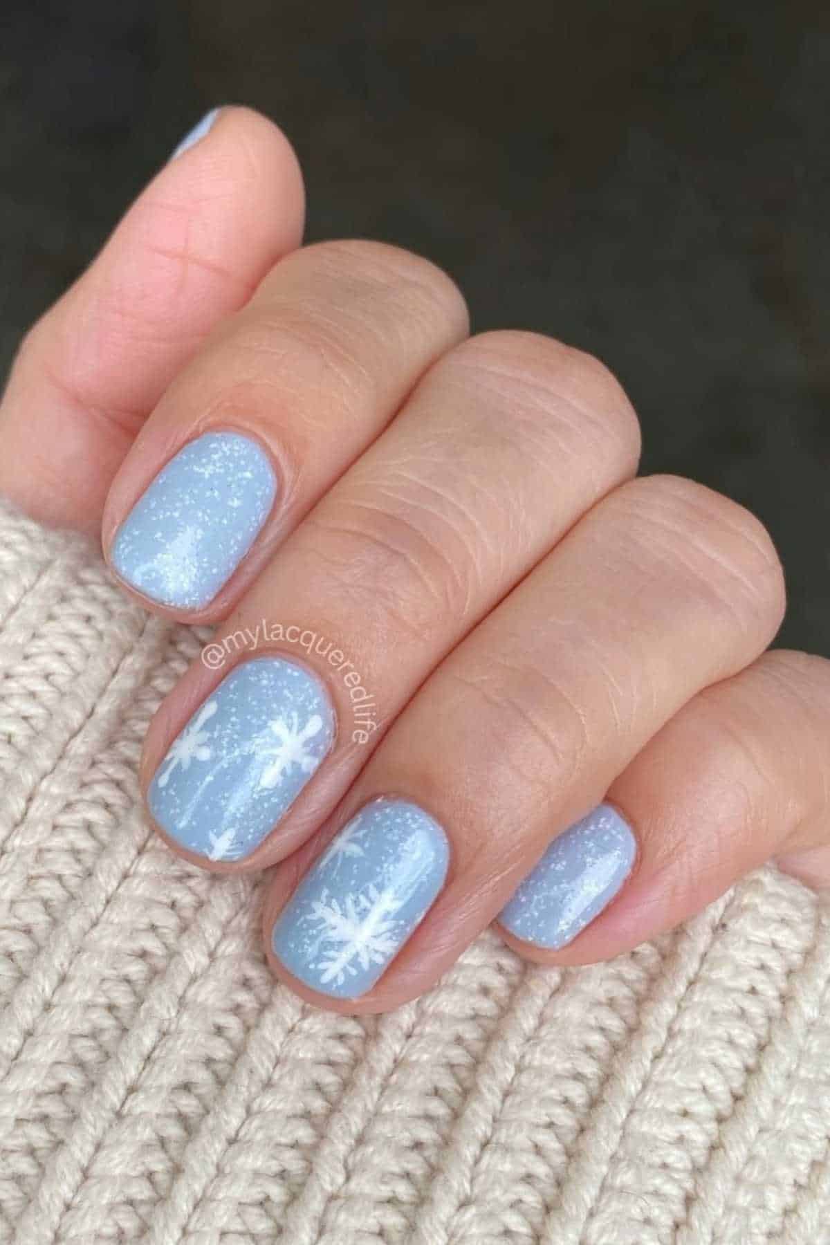 40 Snowflake Nail Designs for an Elegant Winter Touch