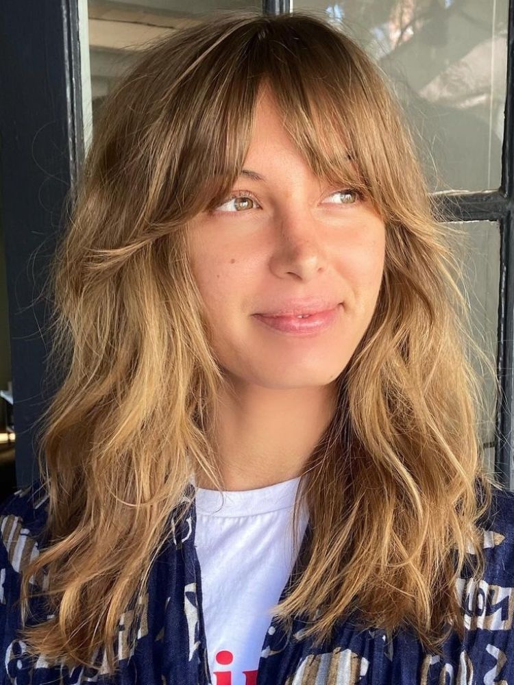 Shoulder Honey Blonde Shag With Choppy Layers Shoulder Honey Blonde Shag With Choppy Layers — Winter Haircuts with Curtain Bangs