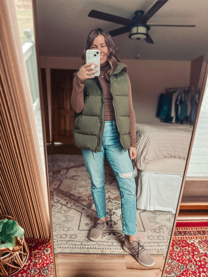 Olive Puffer Vest with Brown Turtleneck and Ripped Jeans Olive Puffer Vest with Brown Turtleneck and Ripped Jeans — Puffer Vest Outfits