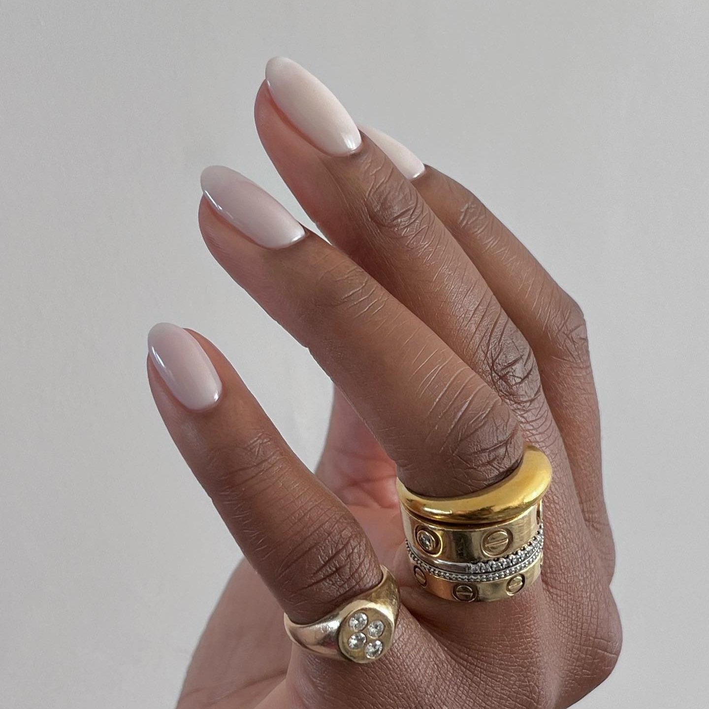 Pale Beige Glossy Medium Almond Nails Pale Beige Glossy Medium Almond Nails — Winter Nail Colors for Dark Skin