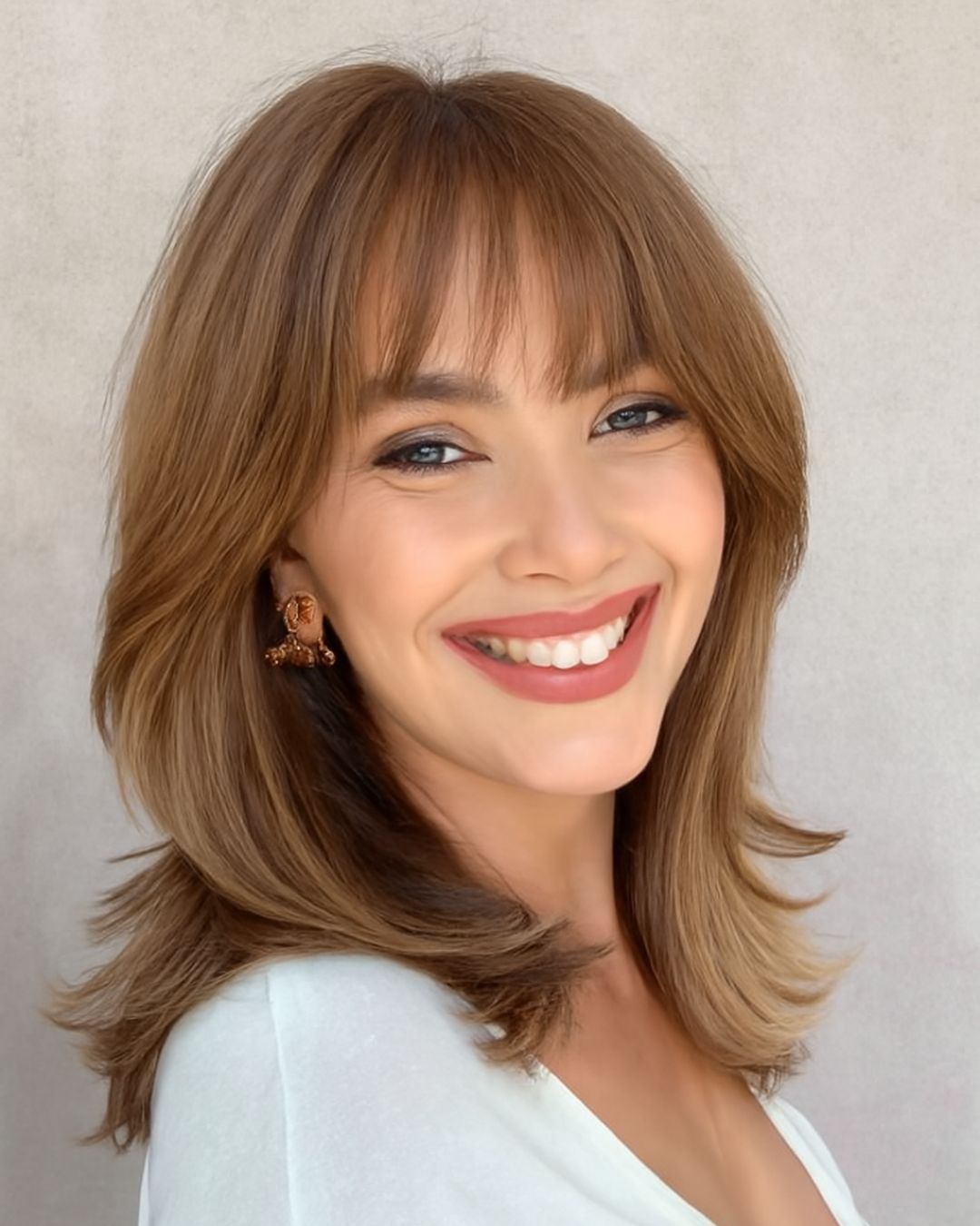 Golden Brown Lob With Wispy Bangs Golden Brown Lob With Wispy Bangs — Winter Hairstyles for Thick Hair