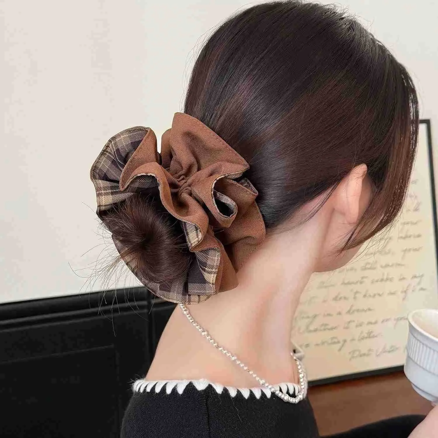 Dark Brown Low Bun With Plaid Scrunchie Dark Brown Low Bun With Plaid Scrunchie — Winter Bun Hairstyles
