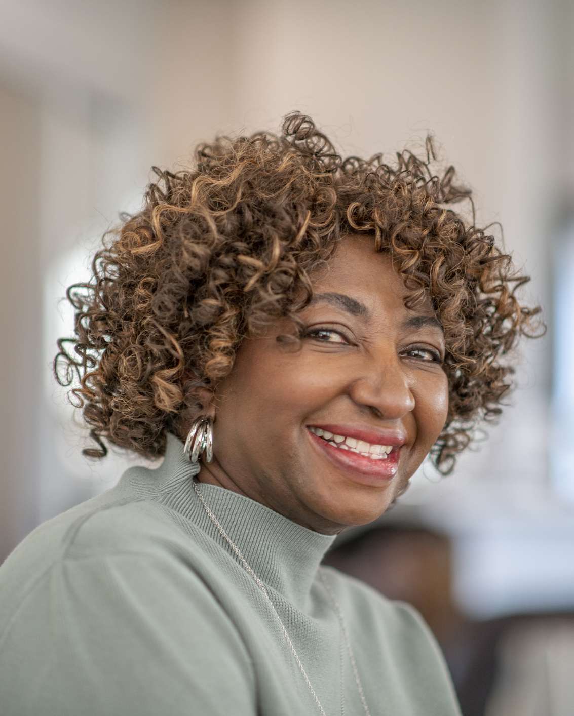 Chin-Length Curly Ringlets Chin-Length Curly Ringlets — Winter Hairstyles for Women Over 60