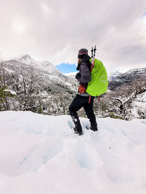 Grey Puffer Jacket and Green Backpack for a Winter Hike — Winter Hiking Outfits