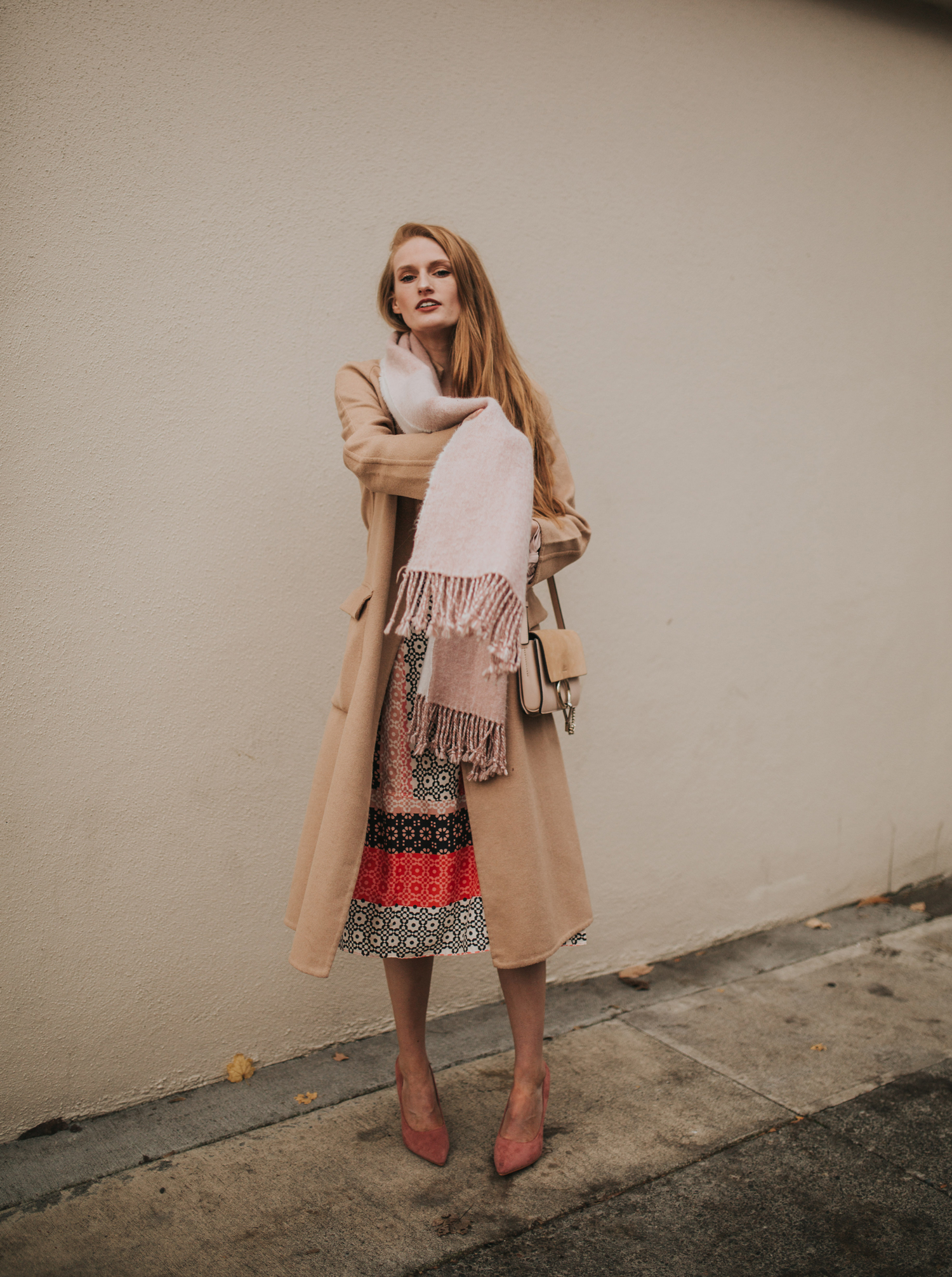 Camel Coat with Geometric Dress and Pink Accessories Camel Coat with Geometric Dress and Pink Accessories — Camel Coat Outfits