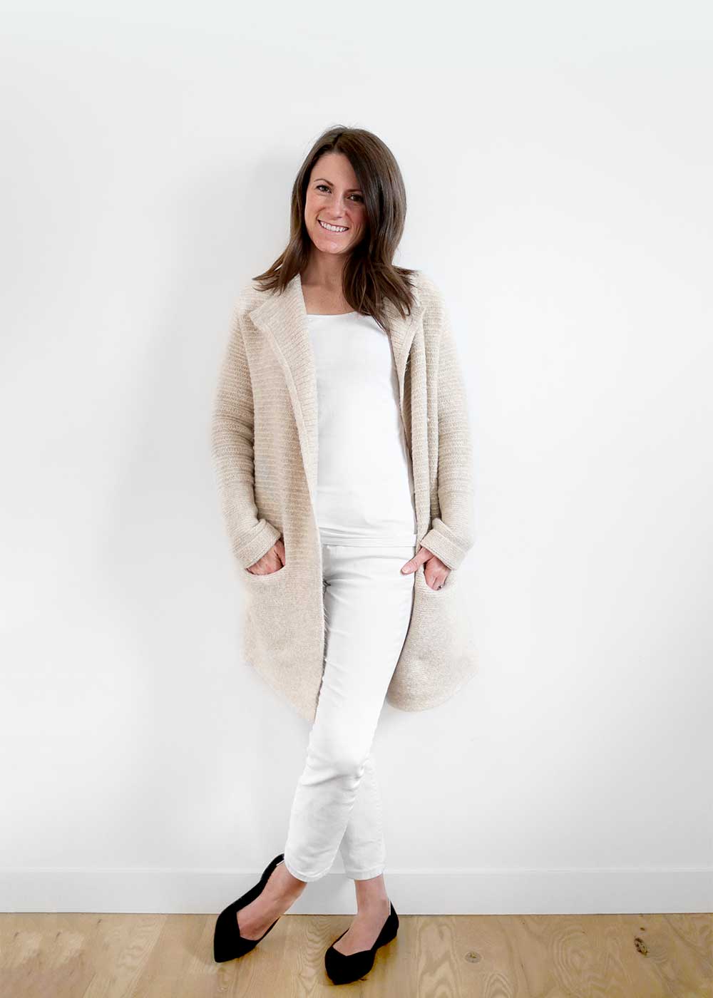 Cream Textured Cardigan Over White Top and Trousers Cream Textured Cardigan Over White Top and Trousers — Minimalist Winter Outfits