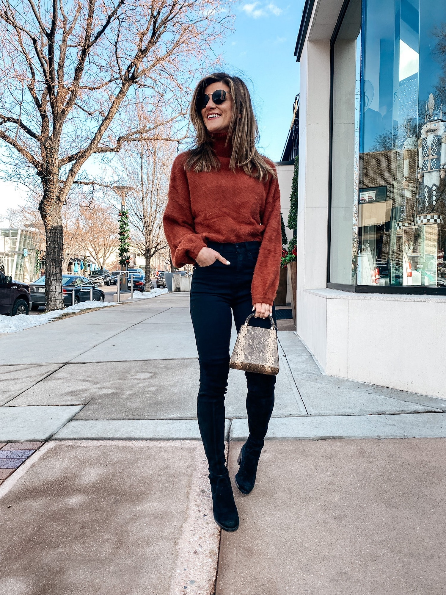 Sleek Black Skinny Jeans with a Burnt Orange Turtleneck — Winter Outfits with Jeans