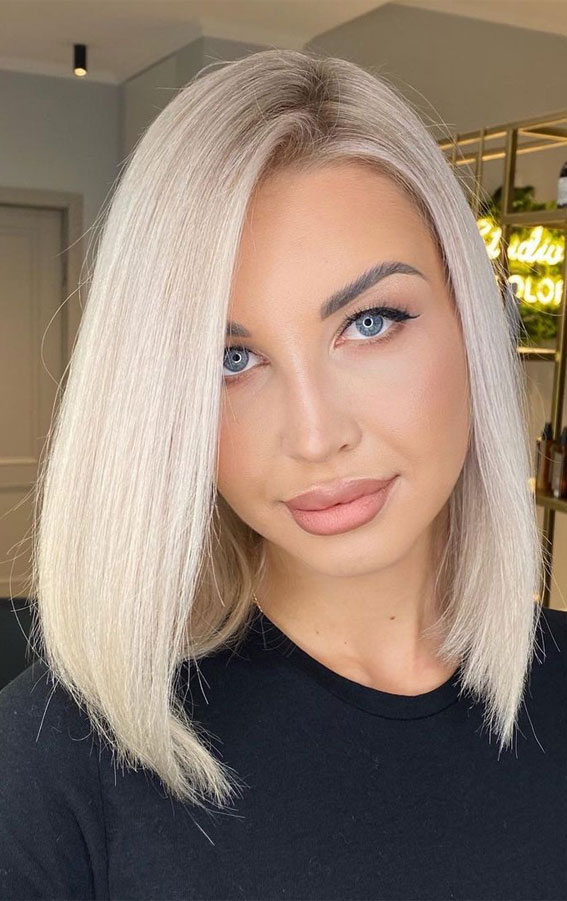Sleek Platinum Blonde Chin Bob — Winter Hair Colors for Blue Eyes