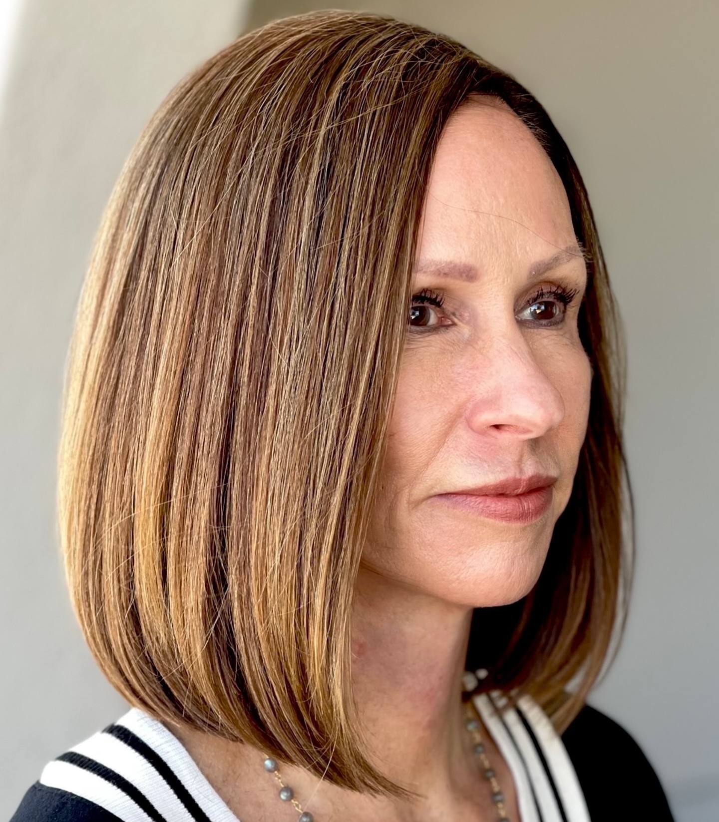 Dark Blonde Bob With Tucked Ends Dark Blonde Bob With Tucked Ends — Winter Hairstyles for Women Over 40