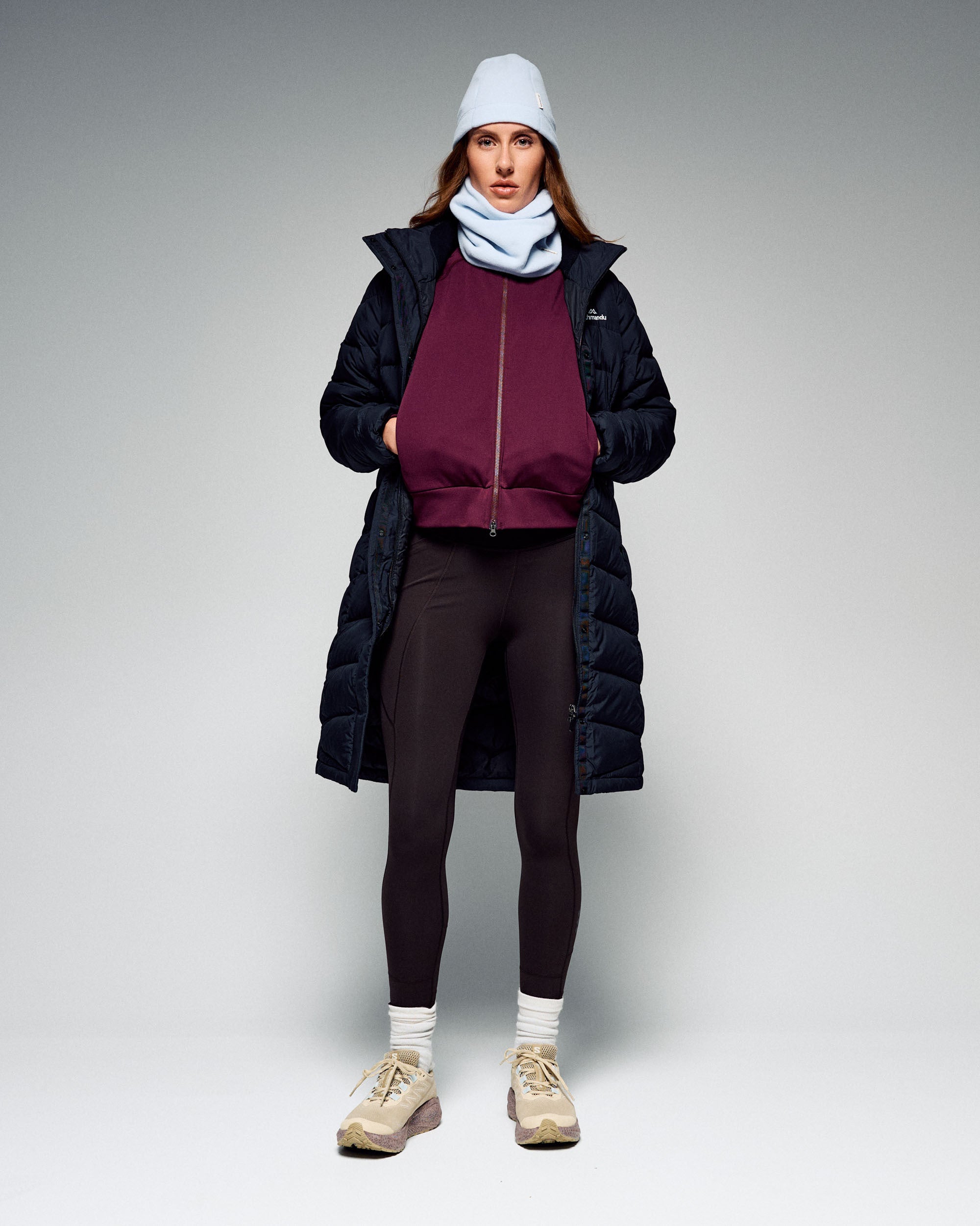 Navy Longline Puffer Coat Over Burgundy Hoodie — Winter Hiking Outfits