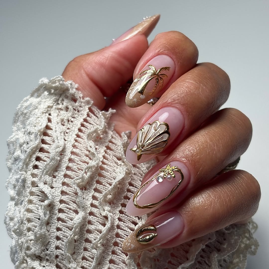 Sheer Pink with Gold Seashell Charms Sheer Pink with Gold Seashell Charms — Trendy Almond Nail Designs