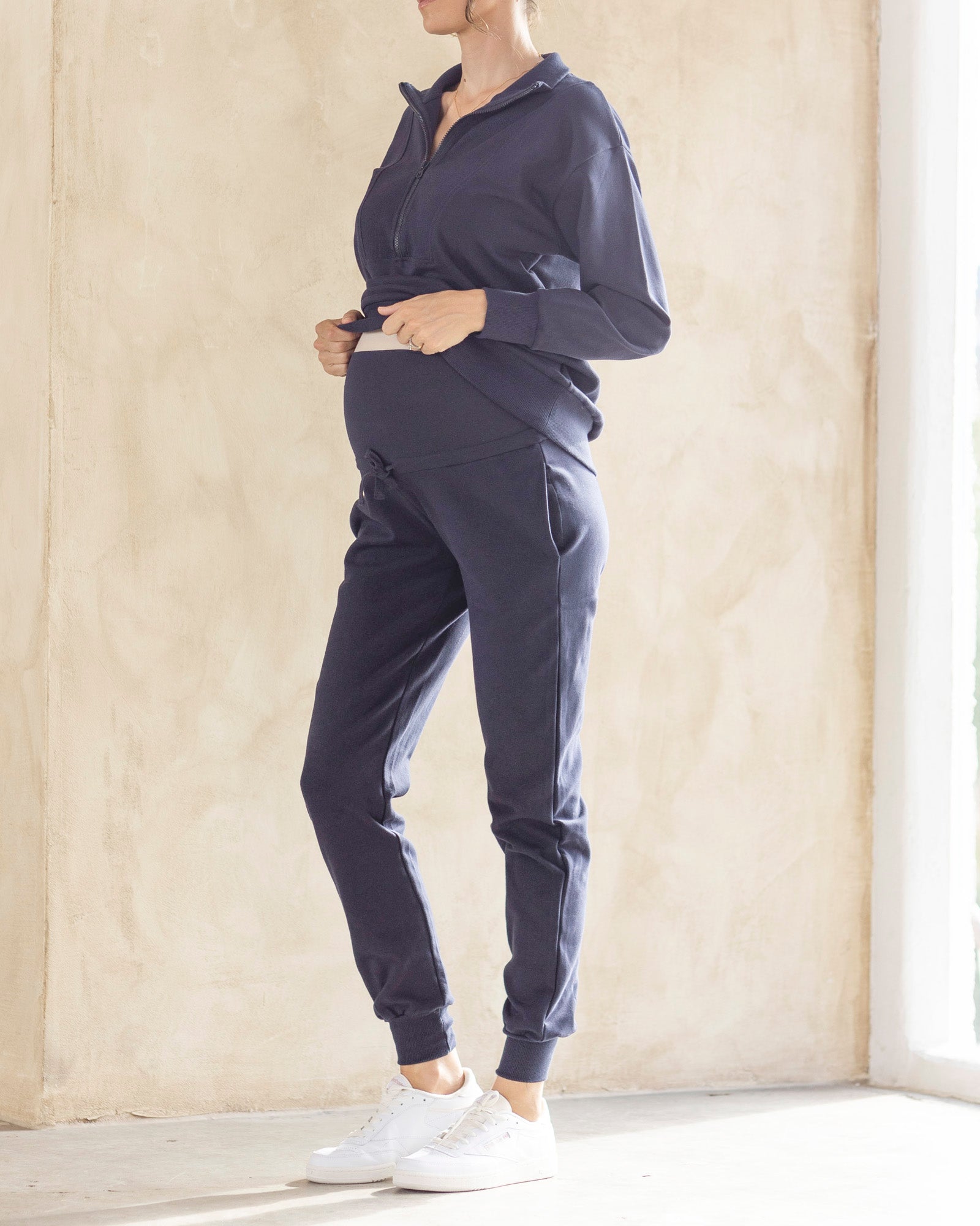 Navy Zip-Up Loungewear Set with Sneakers for Casual Comfort Navy Zip-Up Loungewear Set with Sneakers for Casual Comfort — Winter Maternity Outfits