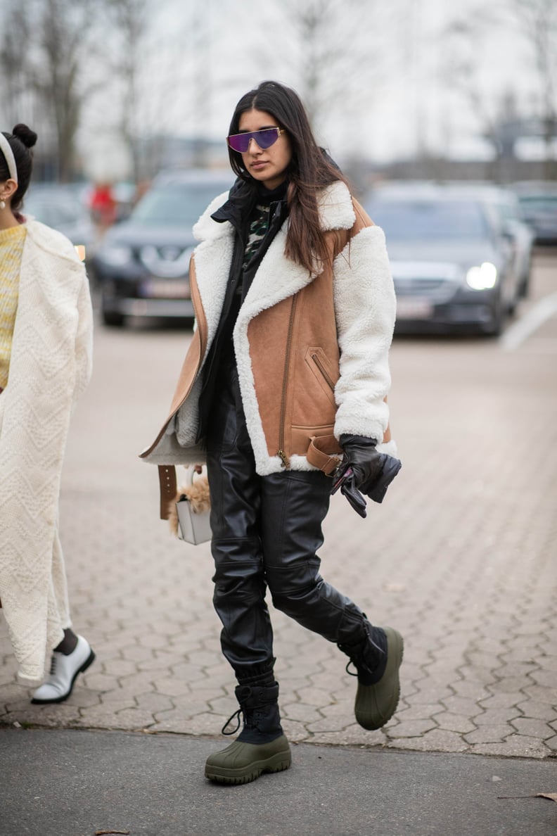 Green Rubber Snow Boots with Faux Leather Pants and Shearling Vest — Snow Boots Outfits