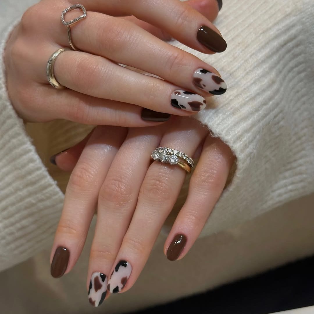Trendy Cow Print Accent Almond Nails Trendy Cow Print Accent Almond Nails — Almond Nail Inspo