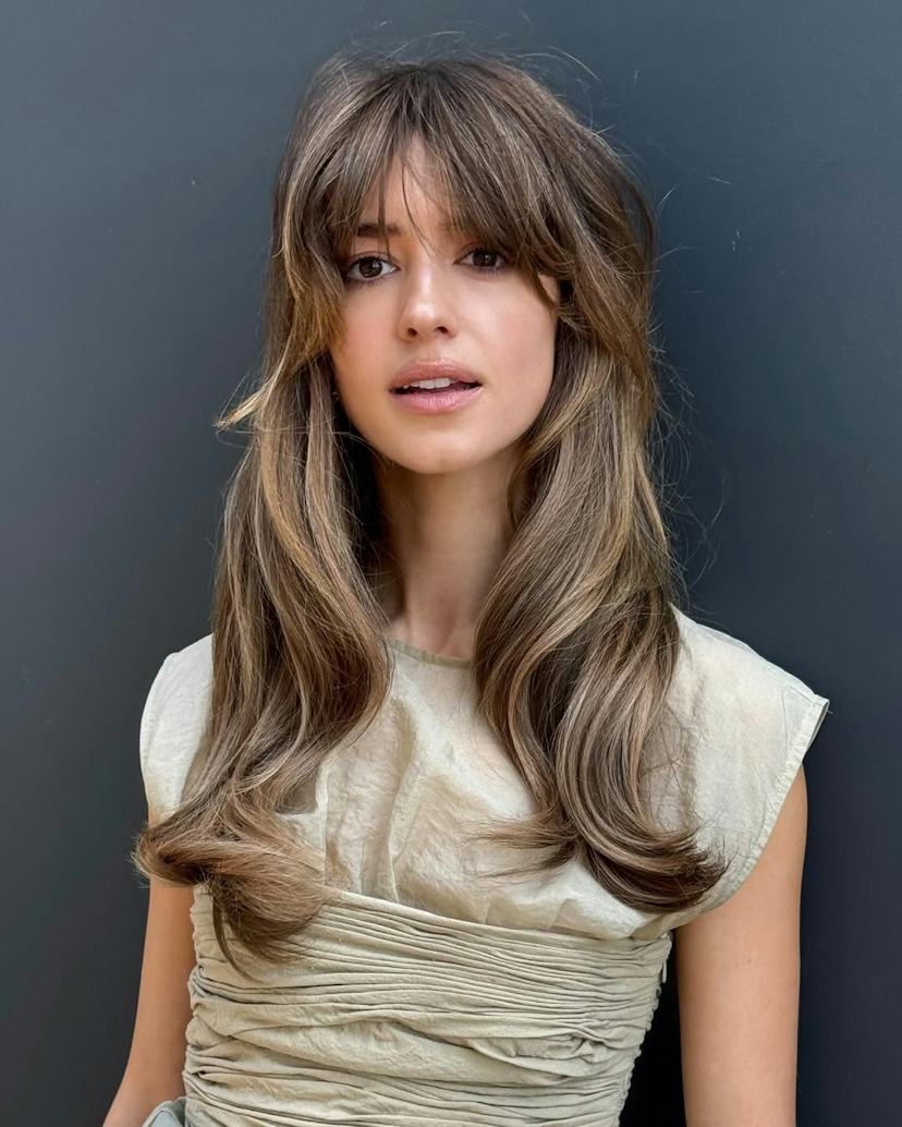 Mid-Back Layers With Face-Framing Bangs — Winter Haircuts for Women