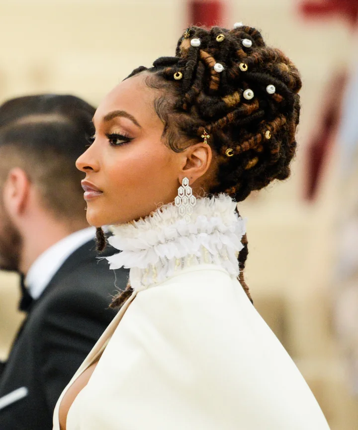 Intricate Loc Updo With Pearls and Beads Intricate Loc Updo With Pearls and Beads — Winter Loc Styles