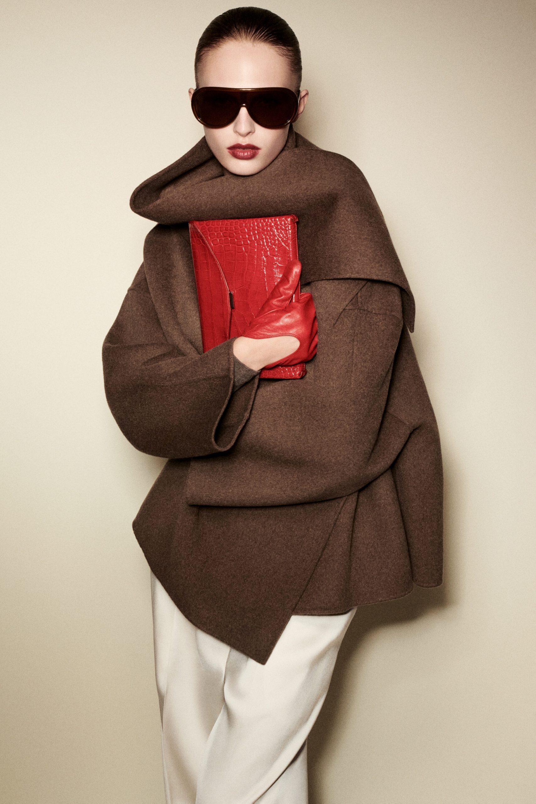 Sculptural Brown Coat: Bold Silhouette with Red Accents Sculptural Brown Coat: Bold Silhouette with Red Accents — Winter Coats for Women