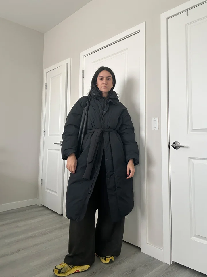 Belted Black Puffer Coat with Olive Trousers — Long Puffer Coat Outfits