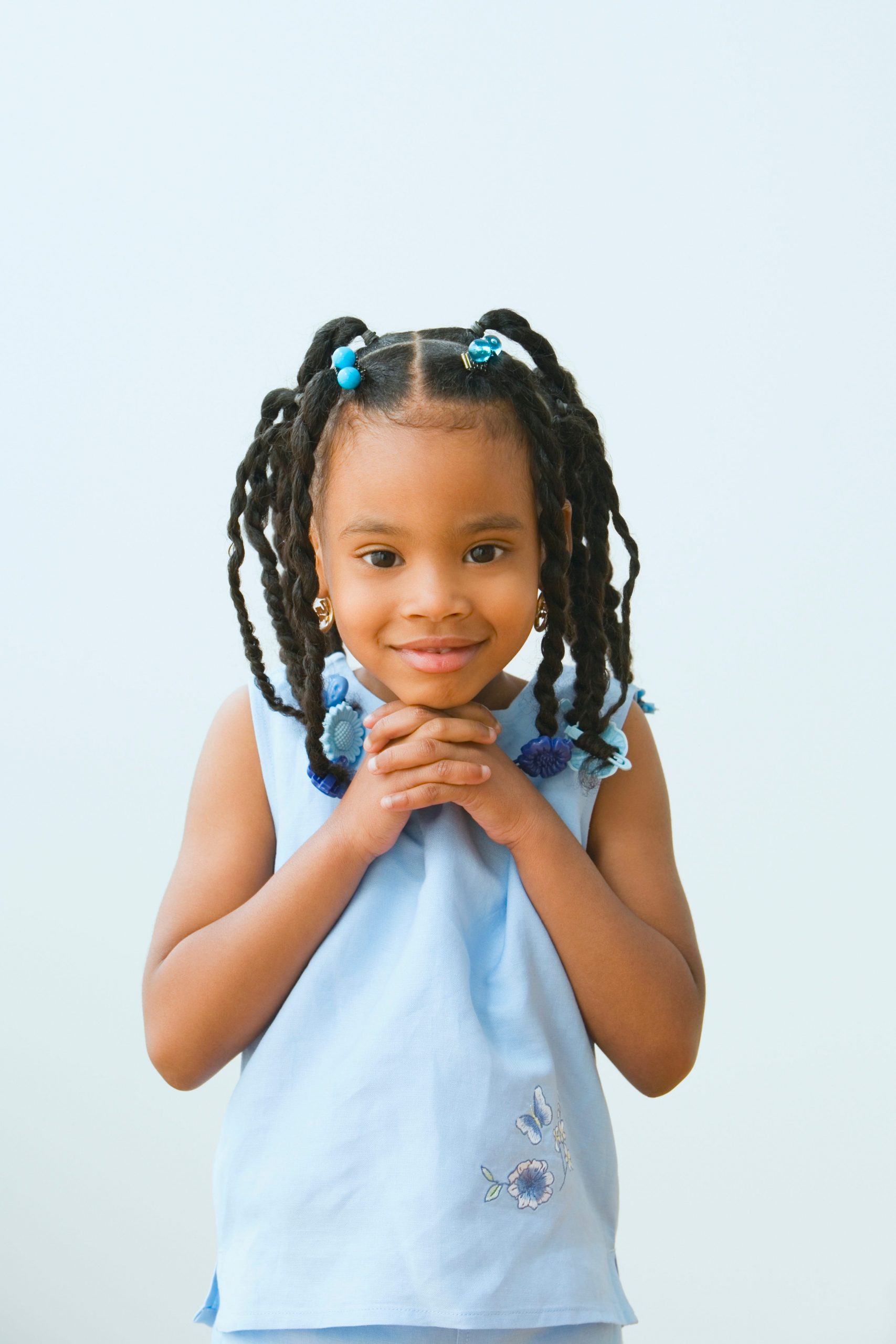 Coily Space Buns With Braids Coily Space Buns With Braids — Winter Hairstyles for Kids