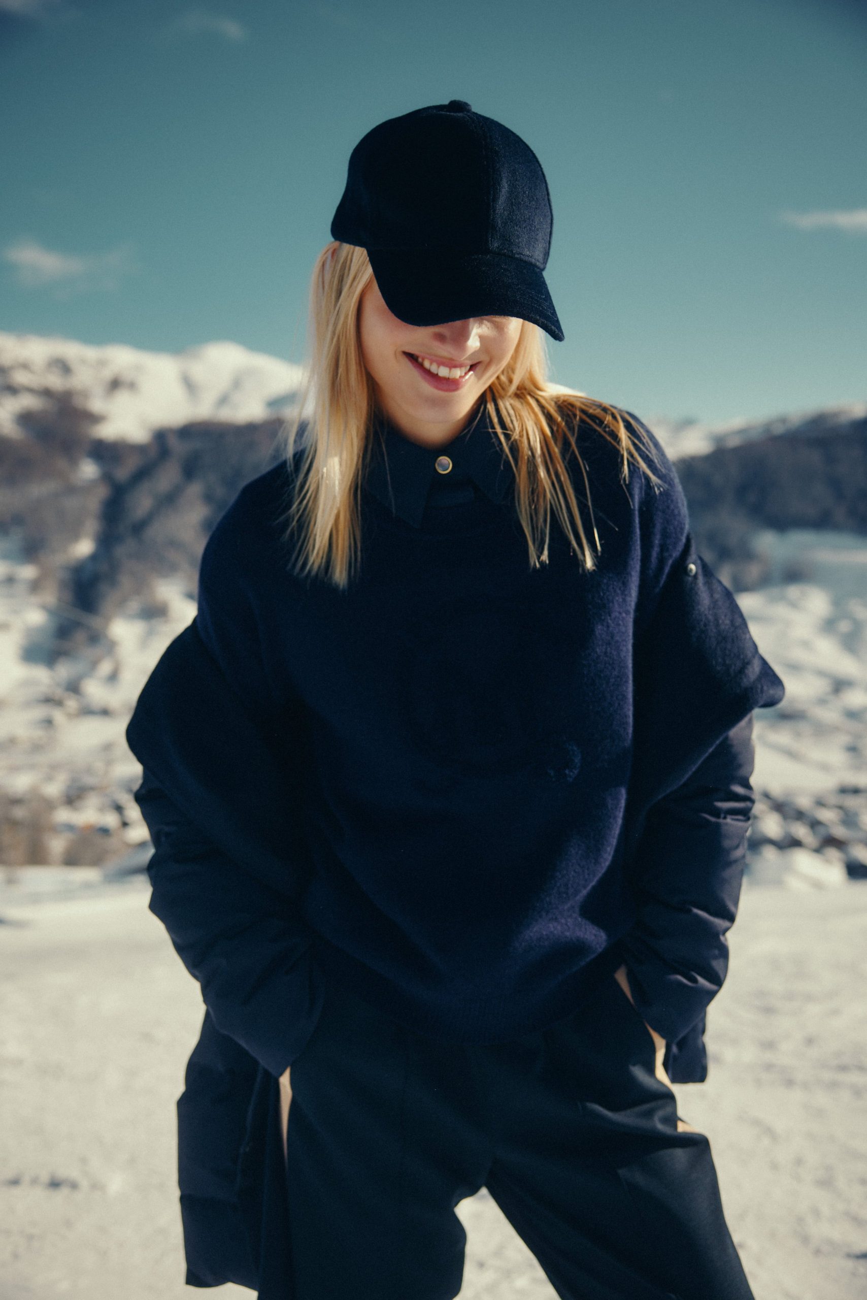 Navy Sweater Enhances Dark Puffer Jacket — Winter Outfits