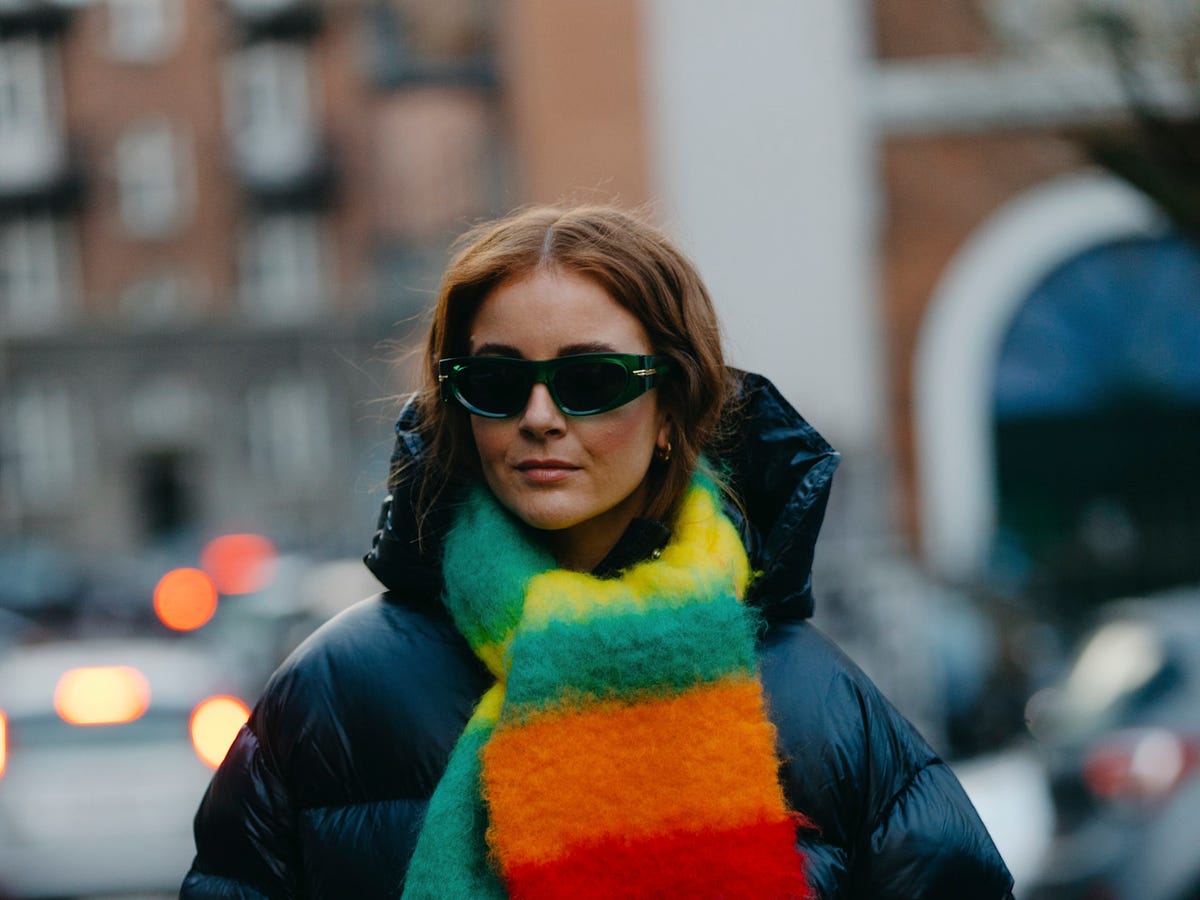 Cozy Black Puffer with Vibrant Striped Scarf Cozy Black Puffer with Vibrant Striped Scarf — Colorful Winter Outfits