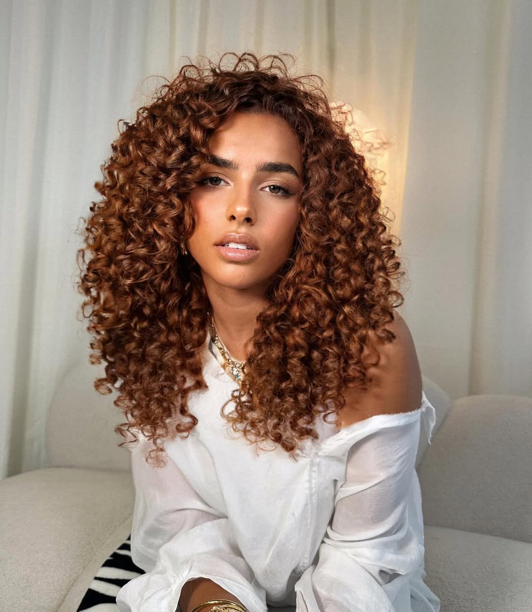 Deep Reddish-Brown Collarbone Curls Deep Reddish-Brown Collarbone Curls — Winter Hair Colors for Curly Hair