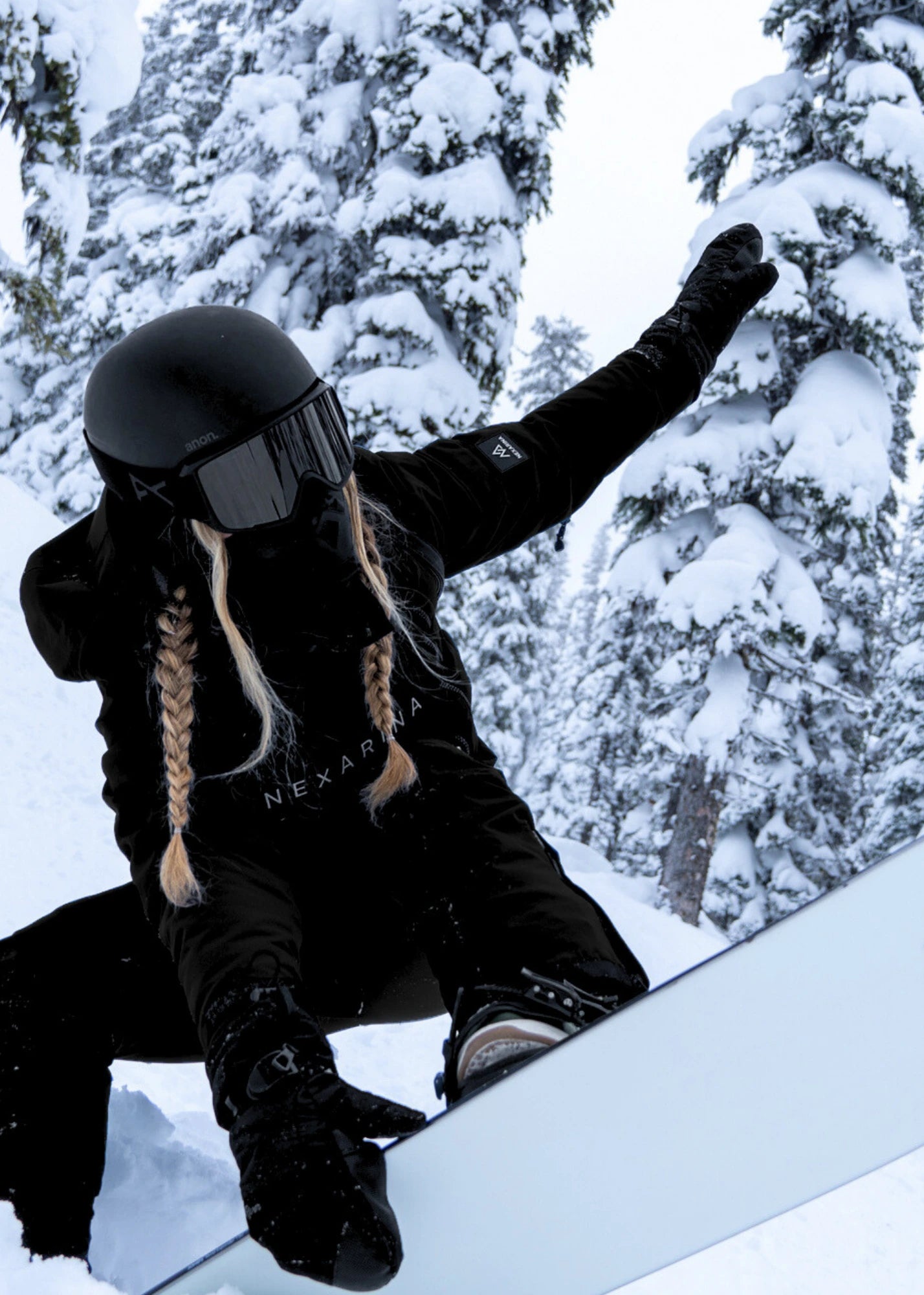 Sleek All-Black: Functional Snowboarding Suit Sleek All-Black: Functional Snowboarding Suit — Snowboarding Outfits