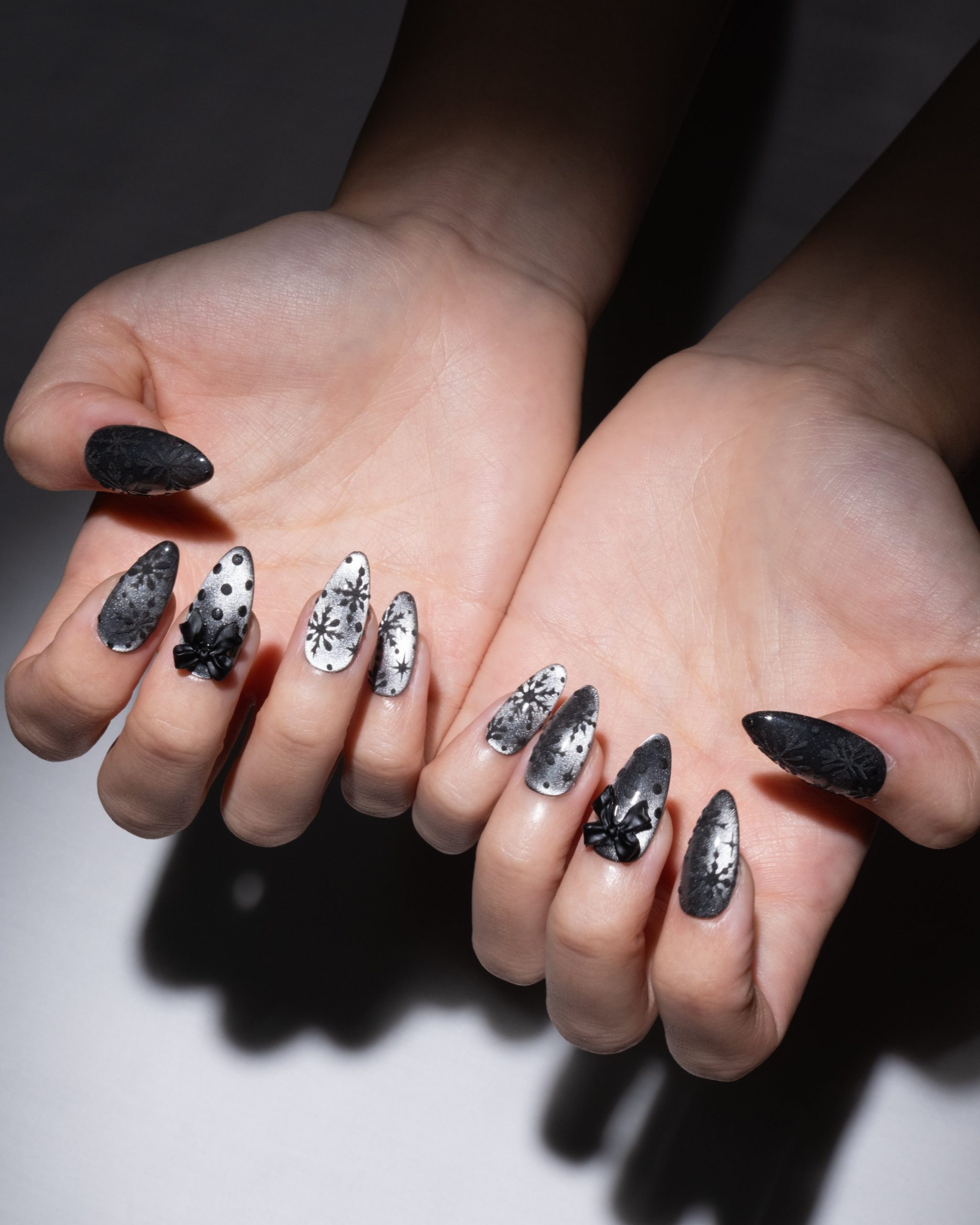 Embossed Black and Silver Stiletto Art — Winter Black Nails