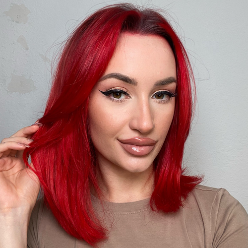 Vibrant Solid Red Lob With Curtain Bangs — Winter Hair Colors for Redheads