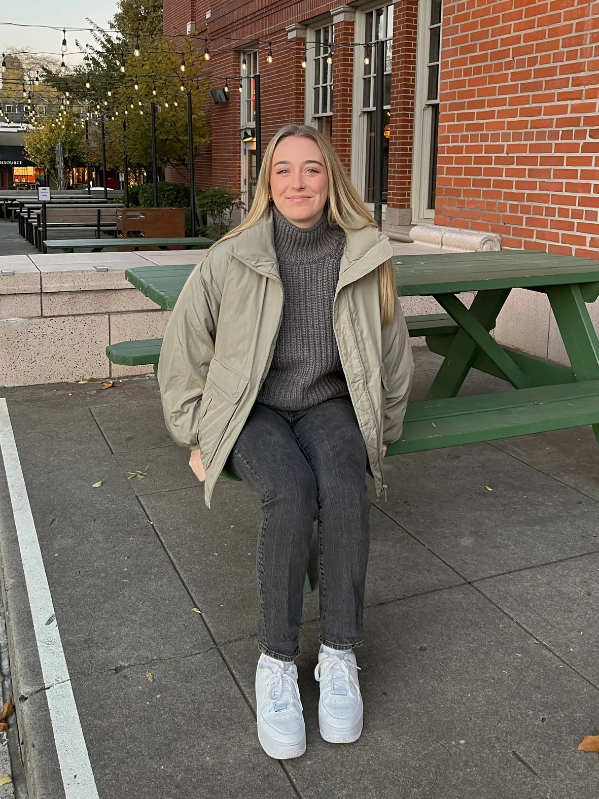 Puffer Jacket and Turtleneck with Slim Jeans and White Sneakers — Topped With An Olive Green Puffer Jacket Puffer Jacket and Turtleneck with Slim Jeans and White Sneakers — Topped With An Olive Green Puffer Jacket — Winter Outfits w