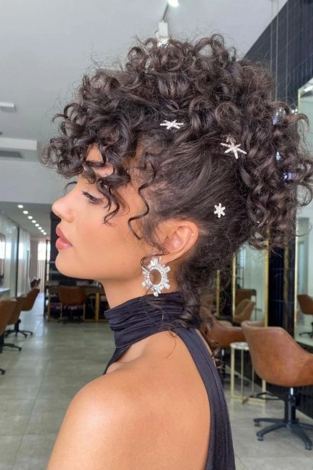 Collarbone Updo With Snowflake Clips Collarbone Updo With Snowflake Clips — Winter Hairstyles for Curly Hair