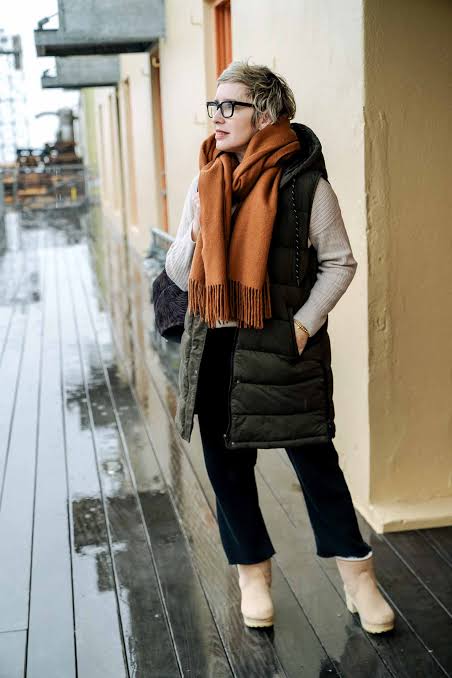 Olive Puffer Vest with Orange Scarf and Cream Sweater Olive Puffer Vest with Orange Scarf and Cream Sweater — Puffer Vest Outfits