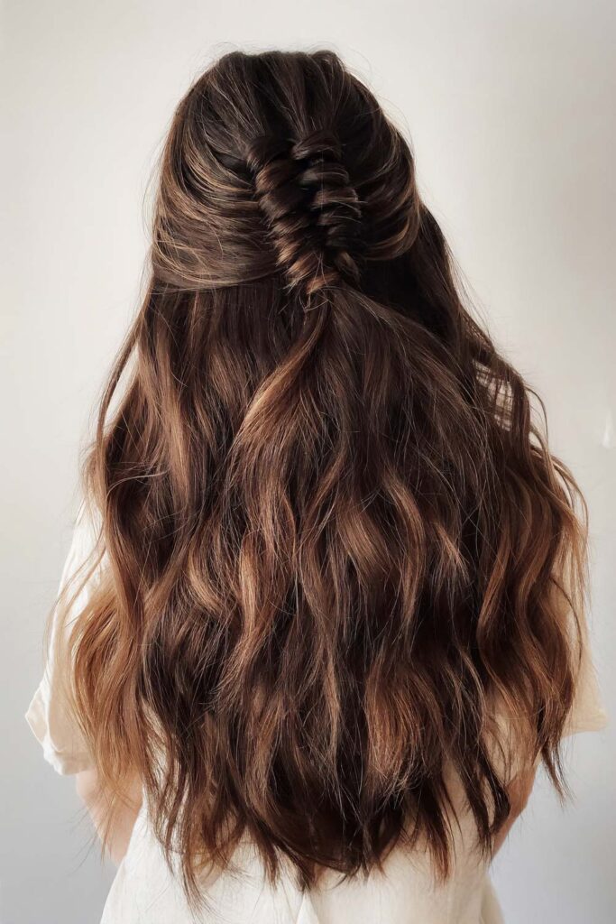 Mid-Back Wavy Hair With Braided Detail Mid-Back Wavy Hair With Braided Detail — Winter Haircuts for Wavy Hair