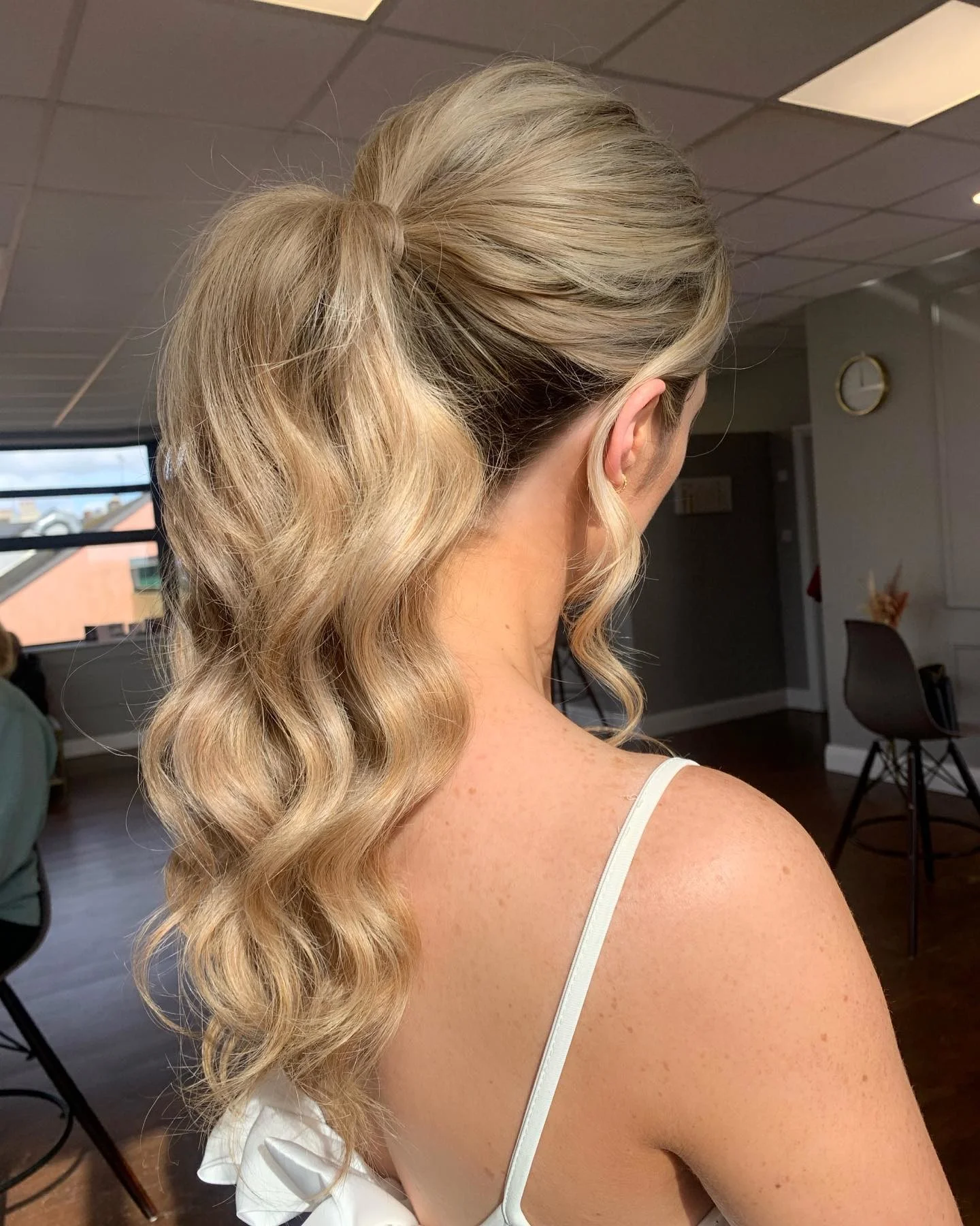 Mid-Back Blonde High Ponytail With Voluminous Curls — Winter Date Night Hairstyles