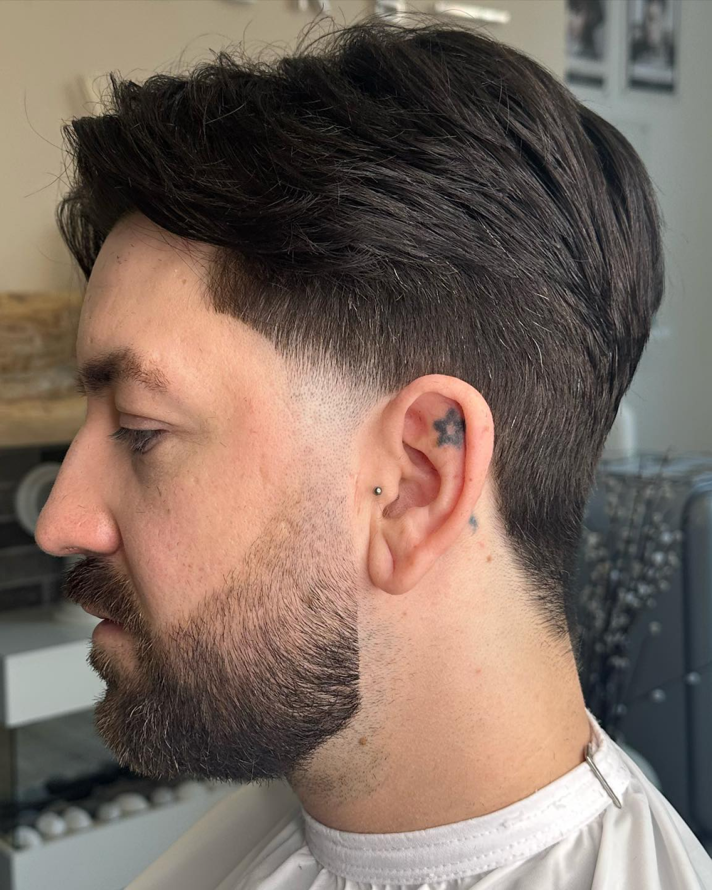 Taper Fade With Textured Swept Back Top — Winter Hairstyles for Men