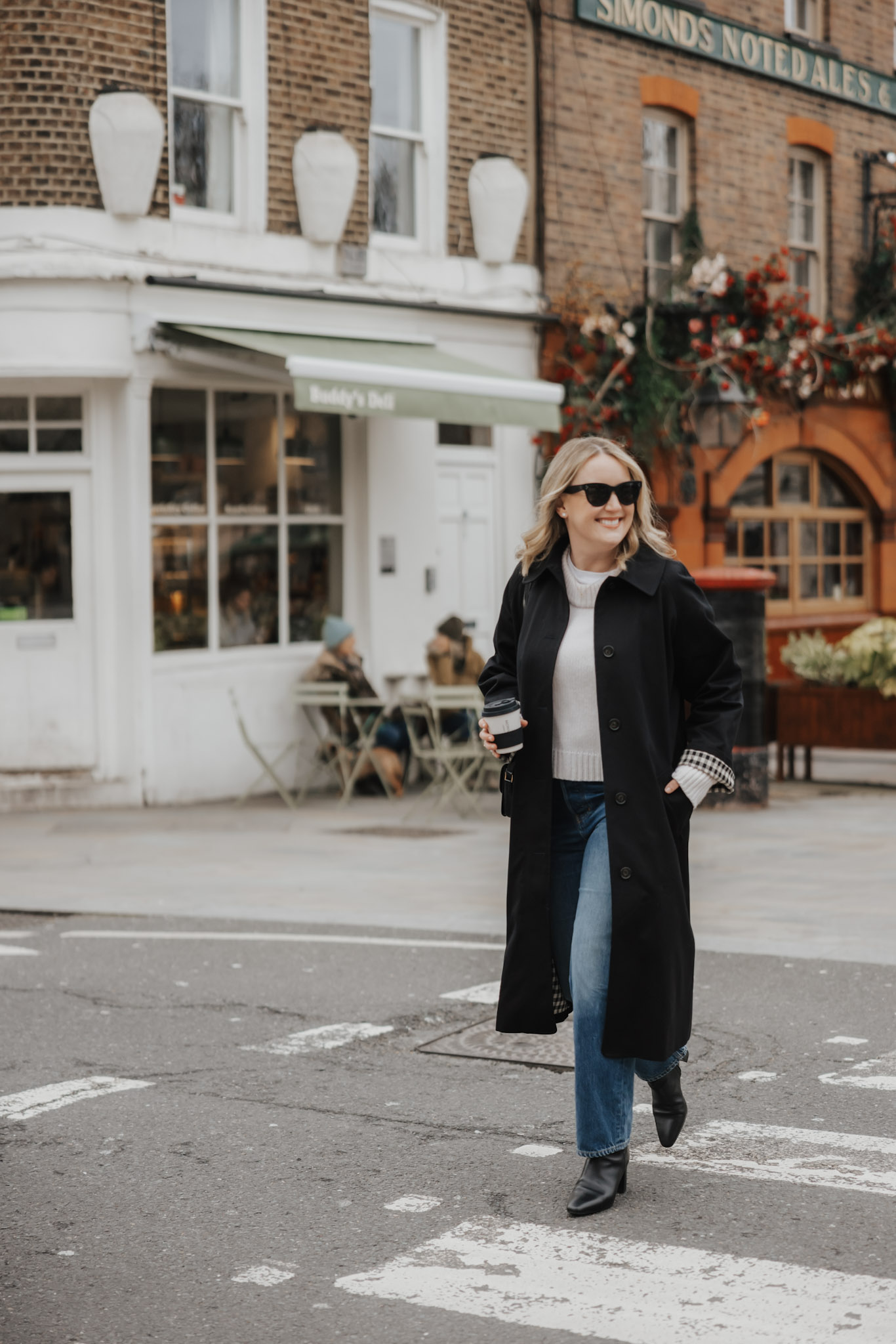 Classic Black Coat with Jeans for Effortless Style — Europe Winter Outfits