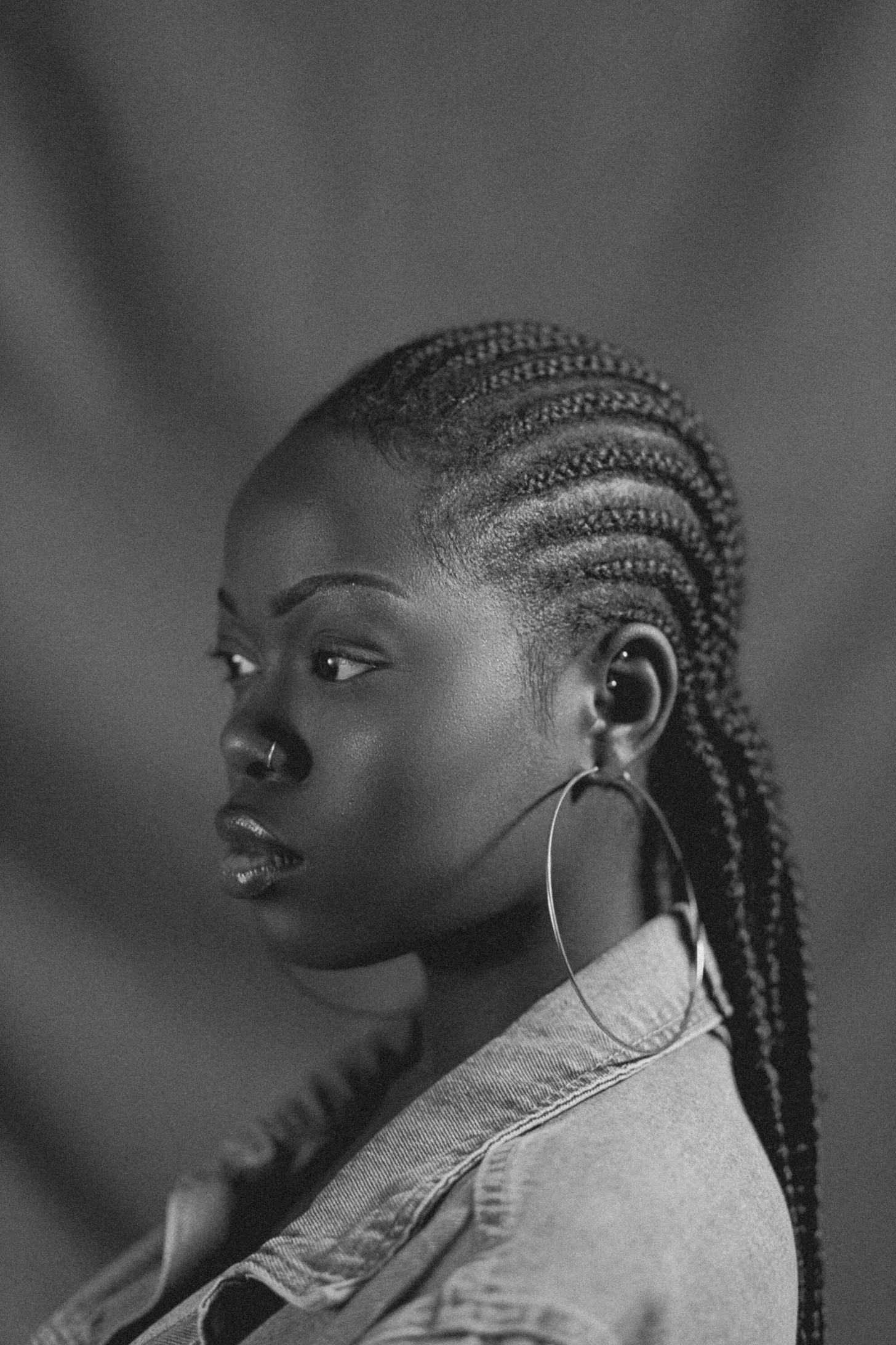 Sleek Mid-Back Black Braids Sleek Mid-Back Black Braids — Winter Knotless Braids