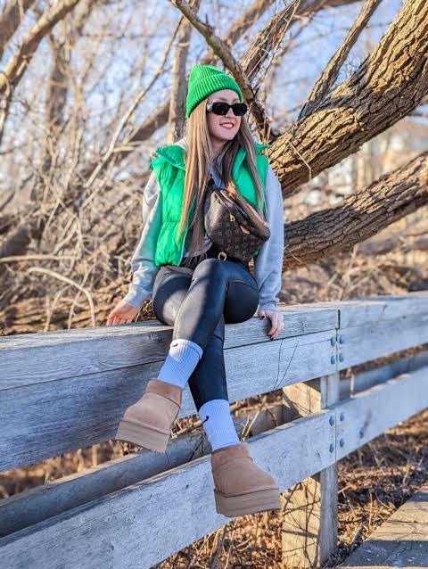 Bold Contrast: Uggs with Green Puffer Vest and Beanie — Ugg Boots Outfits