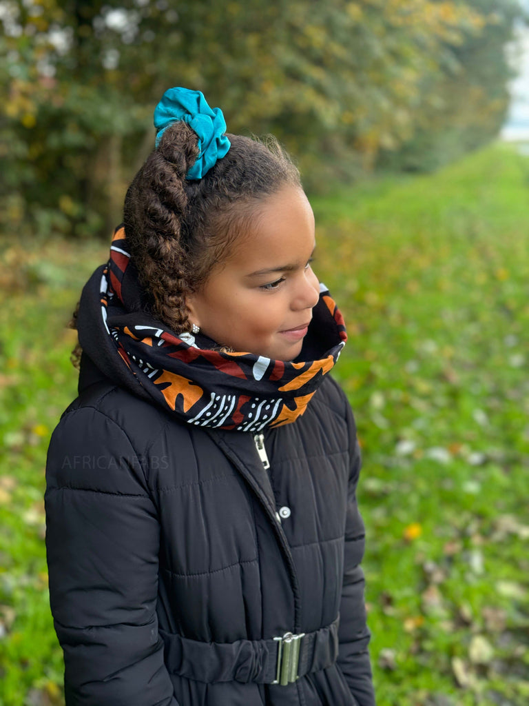 Twisted Braids Bun for Winter — Winter Hairstyles for Black Kids