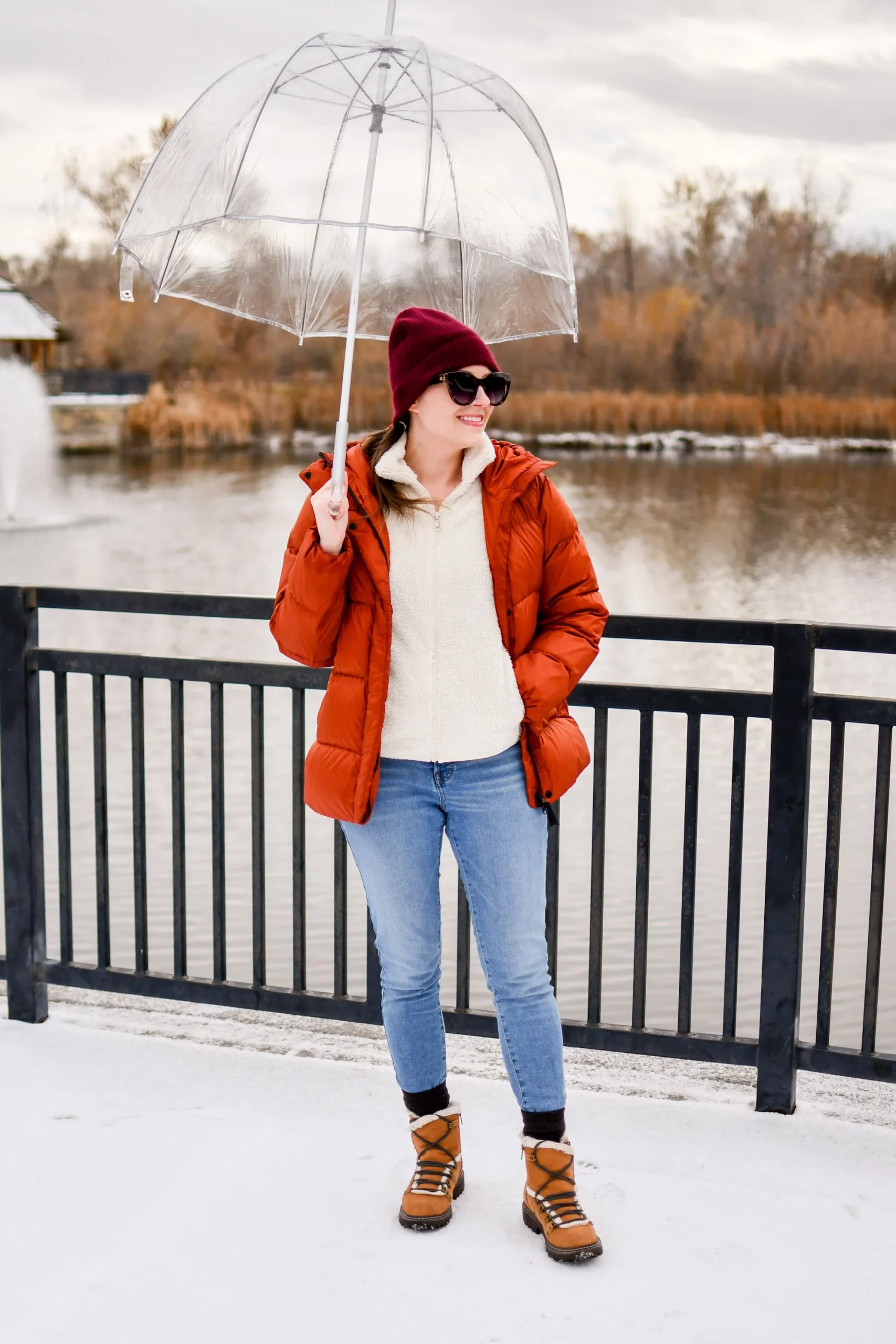 Snow Boots with Orange Puffer Jacket and Beanie — Winter Boots Outfits