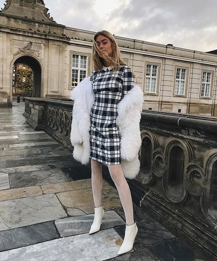 Voluminous White Faux Fur Coat Over Plaid Mini Dress for a Festive Party Look Voluminous White Faux Fur Coat Over Plaid Mini Dress for a Festive Party Look — December Outfits