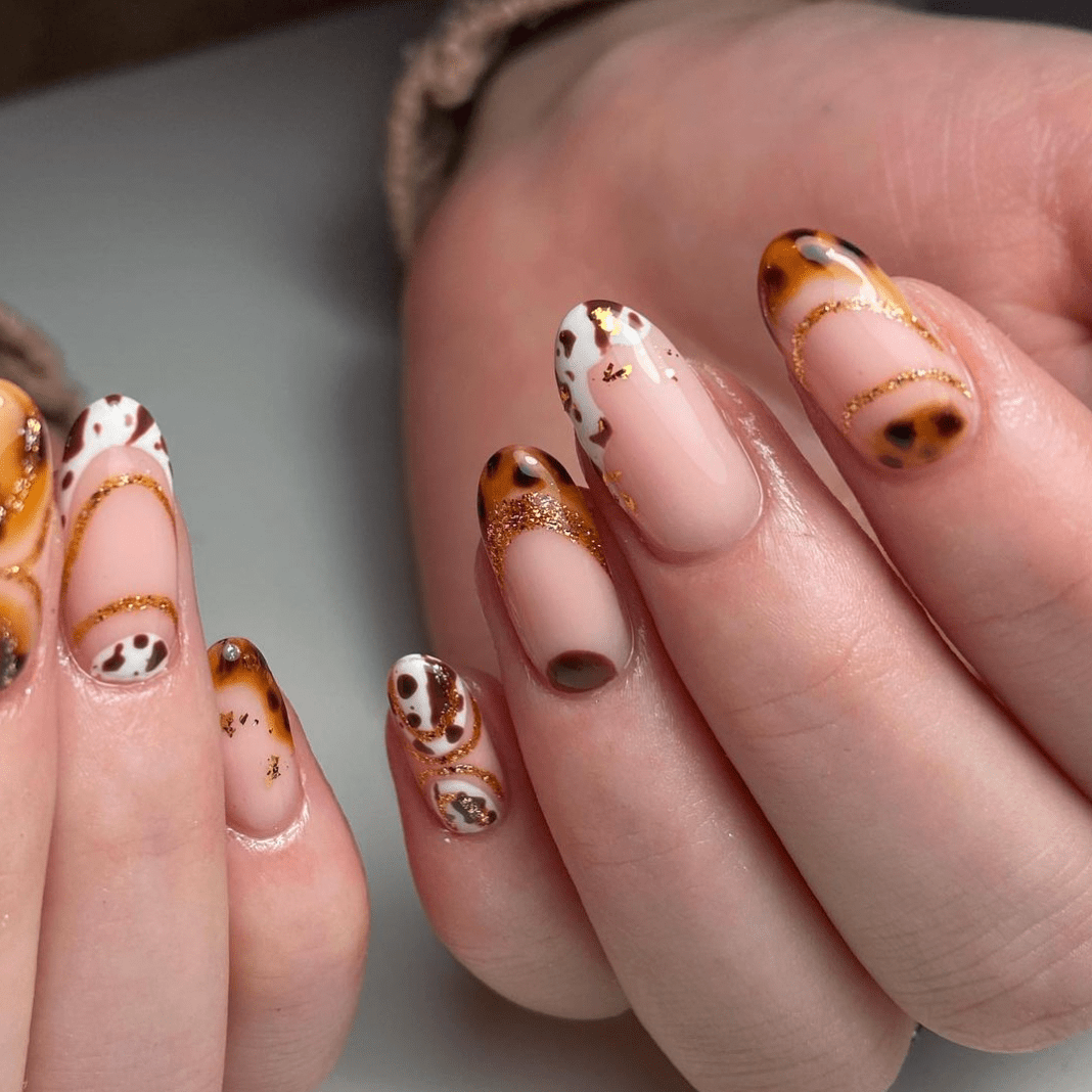 Medium Oval Animal Print with Gold Accents — Easy Nail Designs