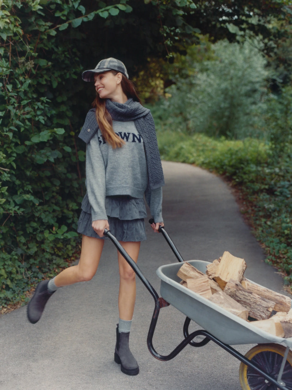Pleated Mini Skirt with Graphic Sweater and Grey Boots Pleated Mini Skirt with Graphic Sweater and Grey Boots — Ankle Boots Outfits