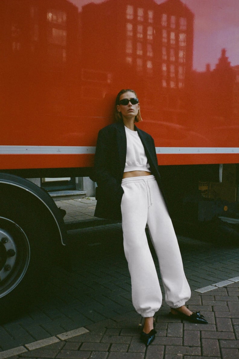 Smart Casual Upgrade: White Cuffed Sweatpants with Black Blazer — Sweatpants Outfits