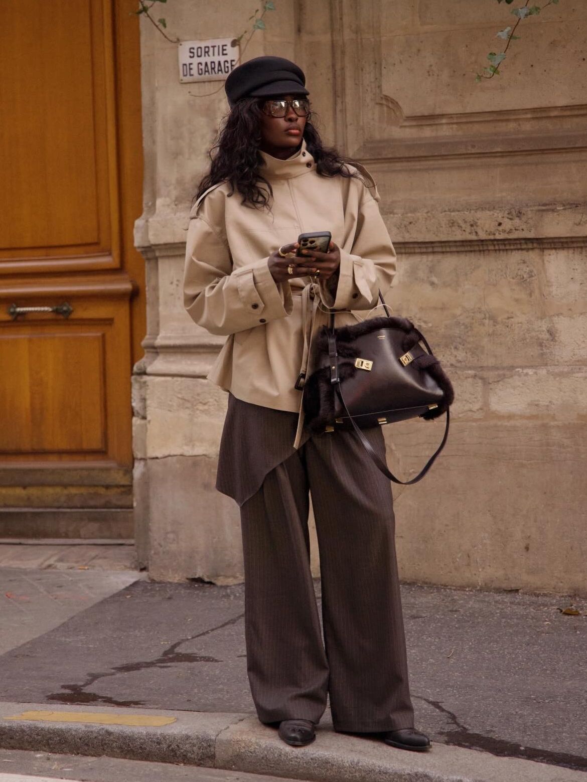 Beige Trench Coat with Asymmetric Skirt Overlay Trousers — Winter to Spring Transition Outfits