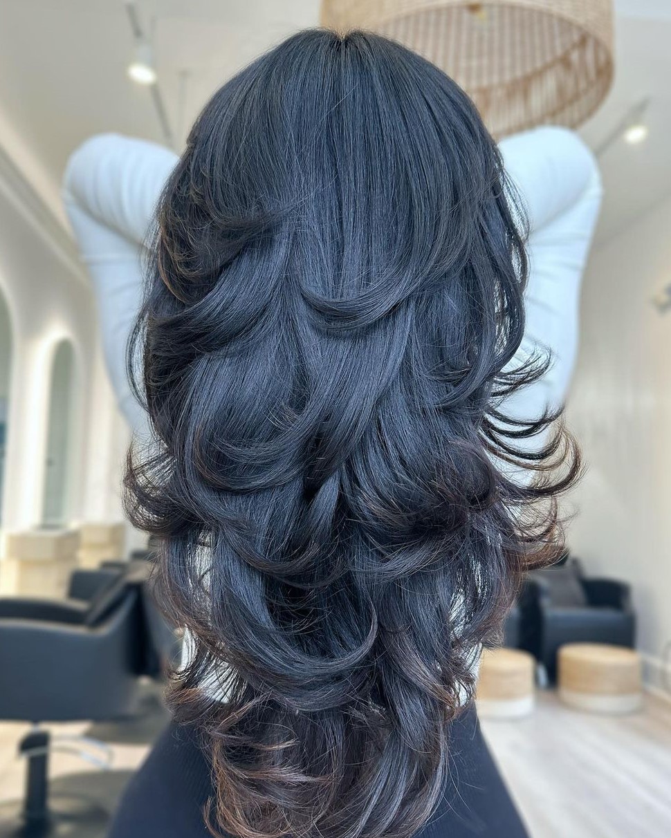Mid-Back Layered Cut With Soft Curls Mid-Back Layered Cut With Soft Curls — Winter Haircuts for Wavy Hair